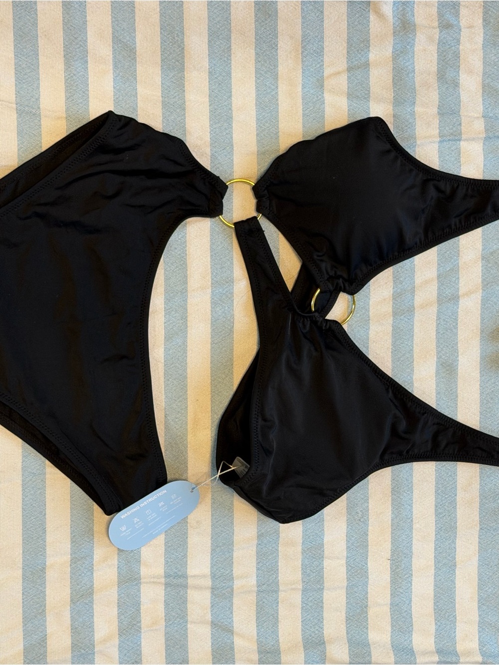 Black One-Piece Swimwear with Gold Rings
